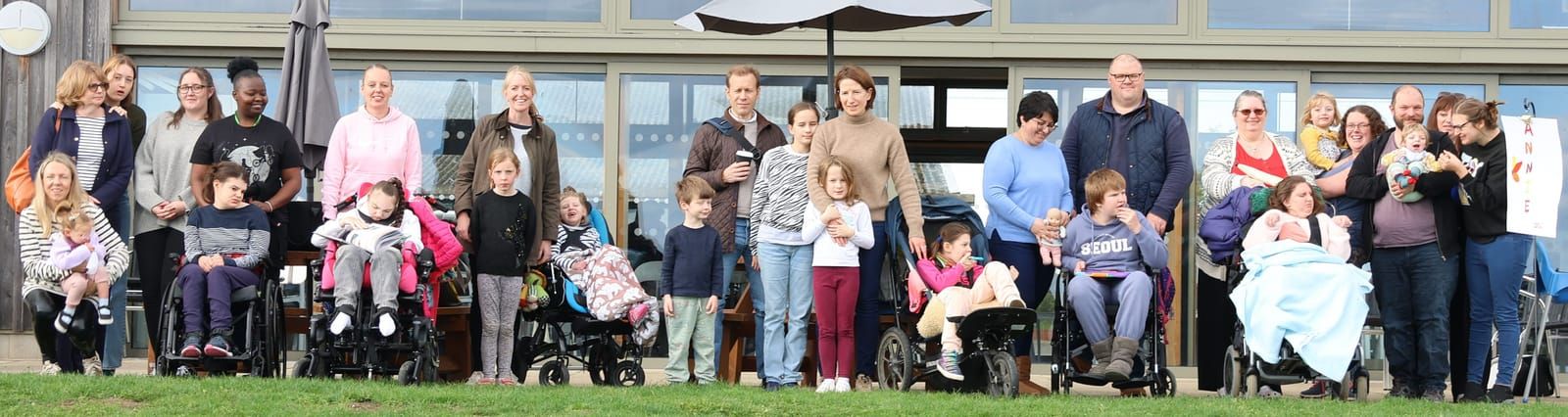 Familias en el encuentro de CASK Research UK de 2024